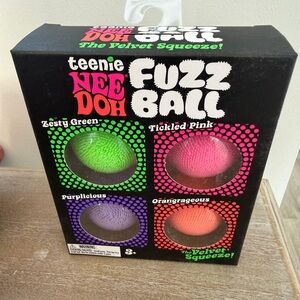 Teenie Nee Doh Fuzz Ball 4-Pack - Green, Pink, Purple, Orange
